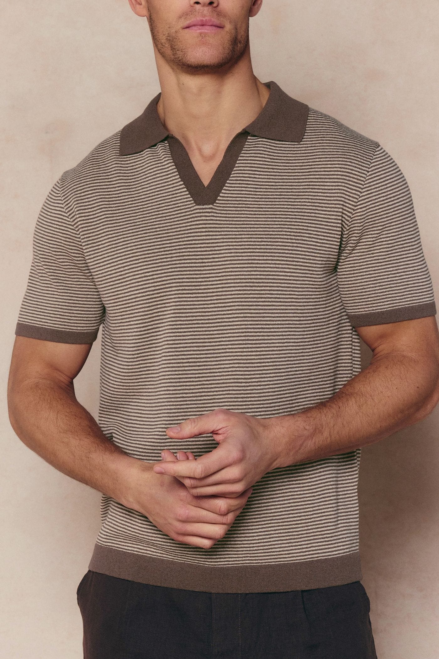Men's Antonio brown/beige striped linen polo with contrast trim, open collar, and ribbed hems.