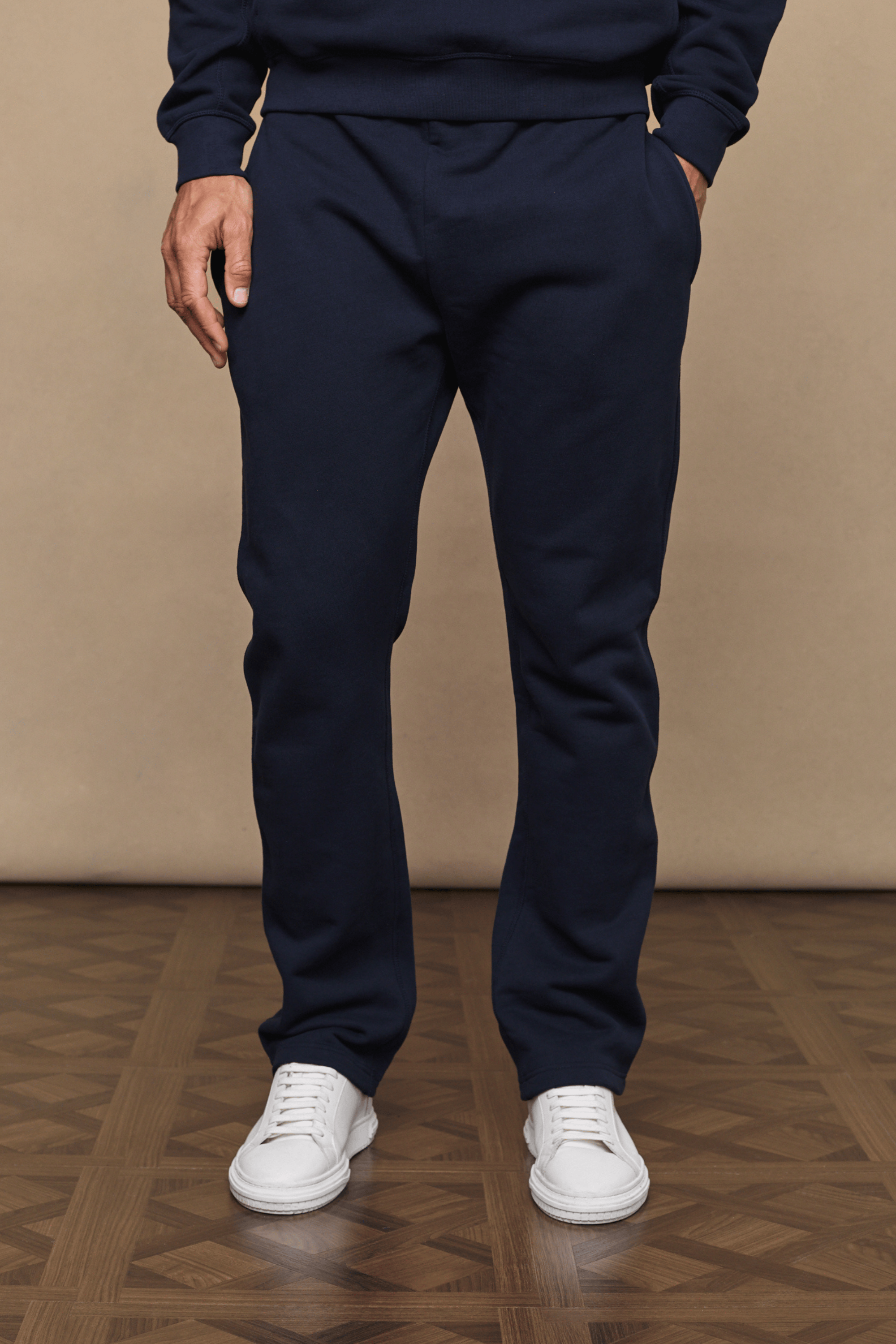 Dark navy Axel straight leg joggers made from heavyweight cotton-polyester blend, with discreet side pockets.