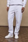 Axel Straight Leg Jogger in Stone Marl, made from heavyweight fleece, paired with a matching hoodie and white sneakers.