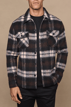 Men's Caldera brushed wool checked jacket in brown, beige, and black with twin chest pockets.