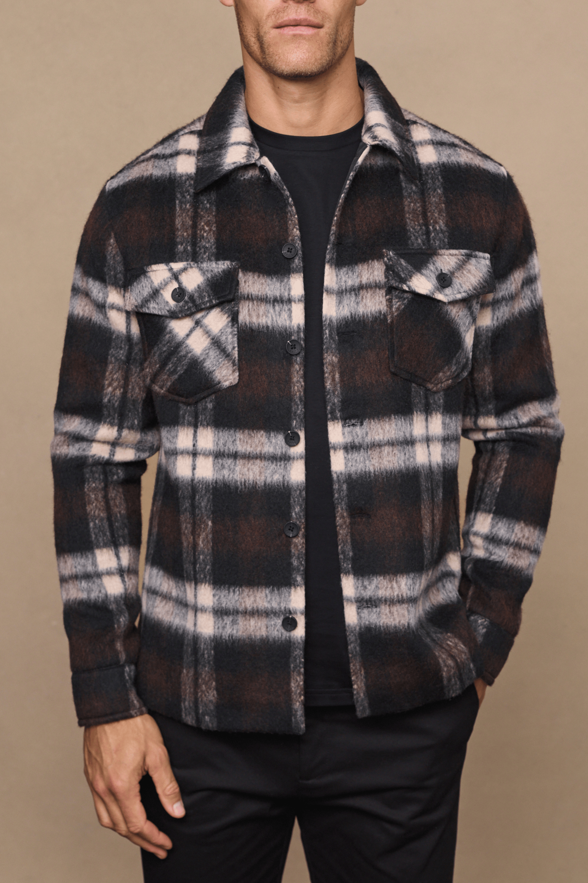 Men's Caldera brushed wool checked jacket in brown, beige, and black with twin chest pockets.