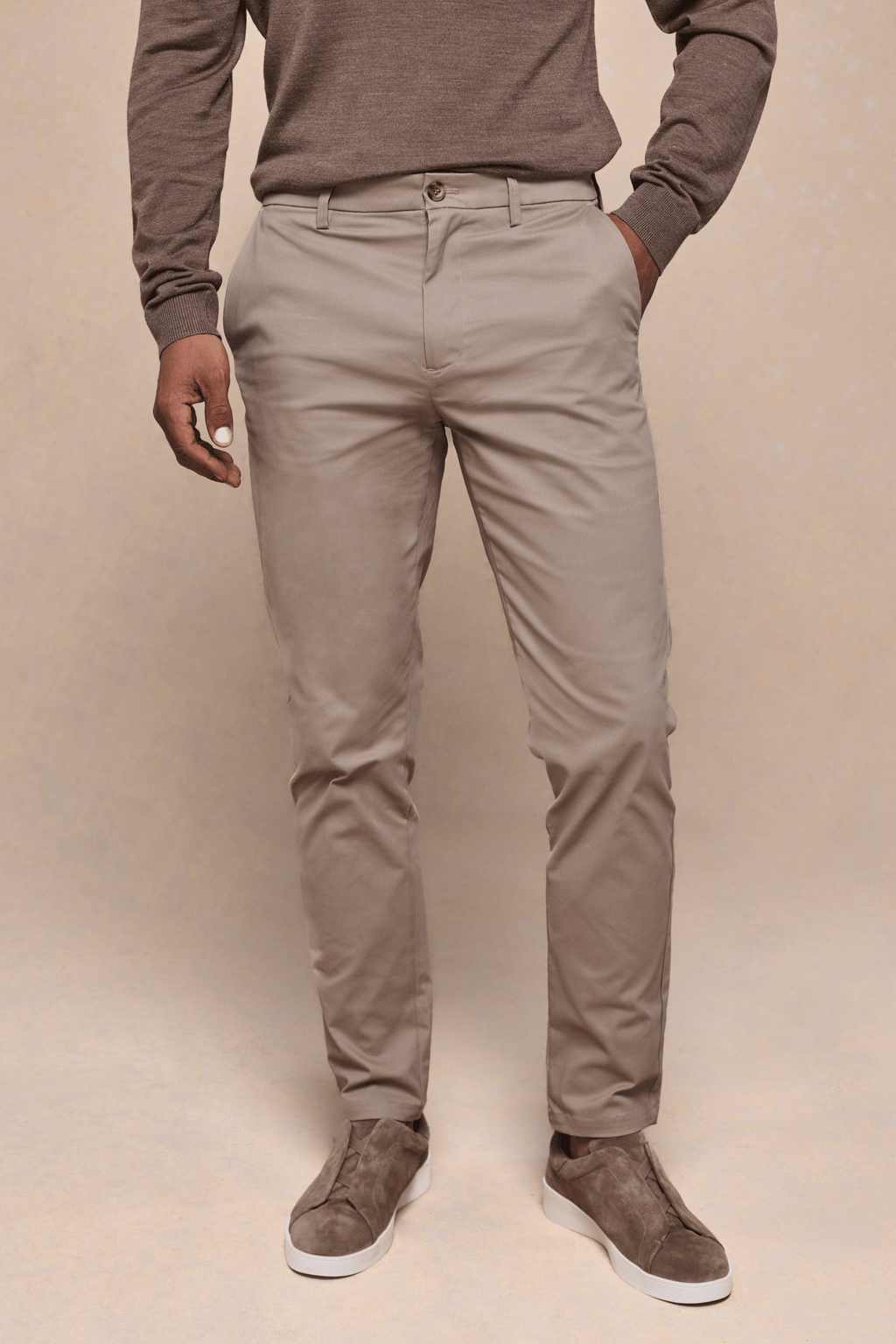 Men's beige Elliot Easy Chino pants with branded faux horn buttons, belt loops, and side pockets.