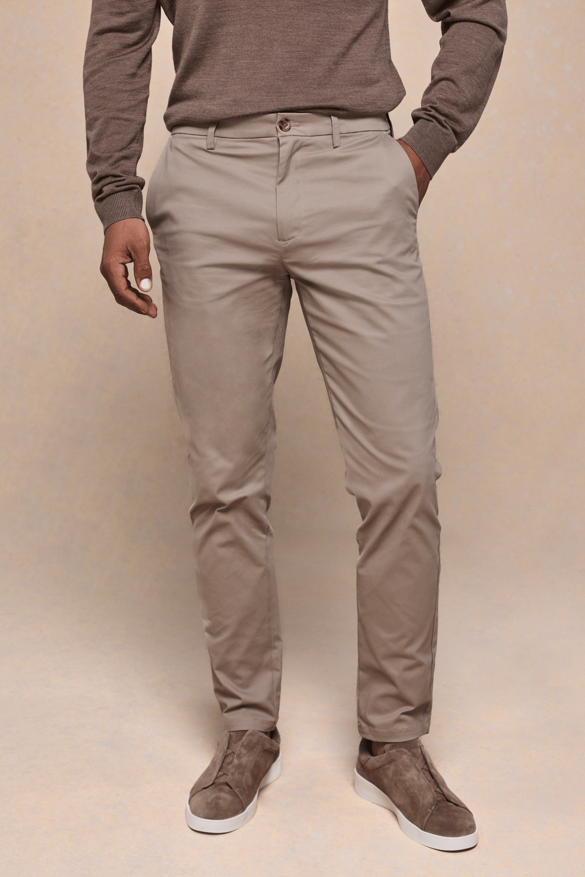 Men's beige Elliot Easy Chino pants with branded faux horn buttons, belt loops, and side pockets.