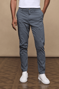 Man wearing slate Enzo Hybrid Trousers, a lightweight 4-way stretch fabric with belt loops and side pockets.