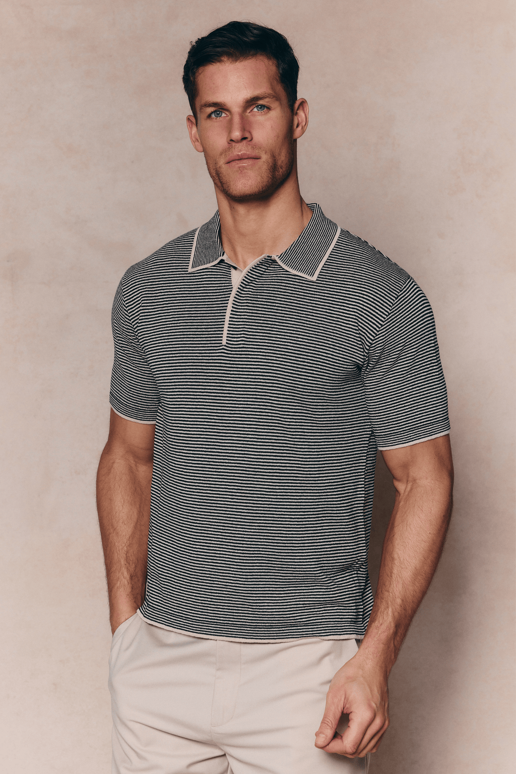 Men's Felipe beige/black striped linen polo with half placket and contrast hems.