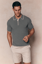 Men's Felipe beige/black striped linen blend polo with contrast hems and half placket.