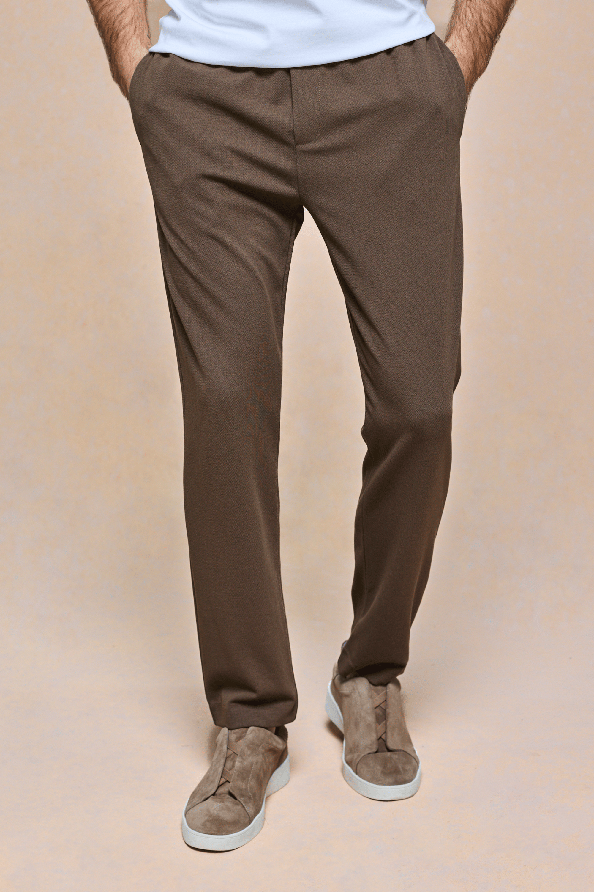 Brown Geneva Textured Tapered Trouser with elasticated waistband, side pockets, and a clean, tailored fit.