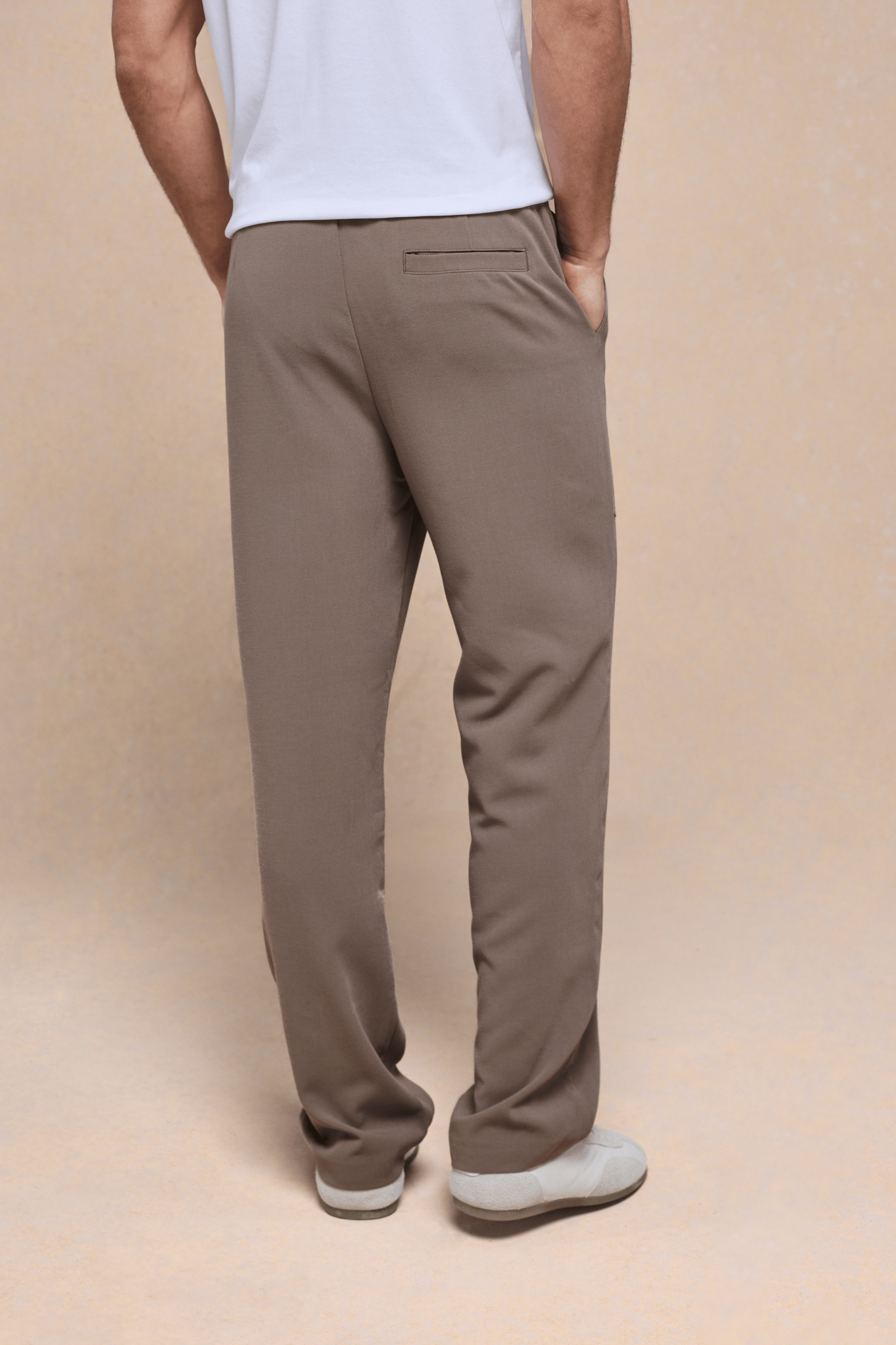 Men's Julien Relaxed Panelled Trouser in olive, straight fit, with top-stitched paneling and side pockets.