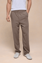 Men's olive Julien relaxed panelled trousers with straight fit, elasticated waist, and front pockets.