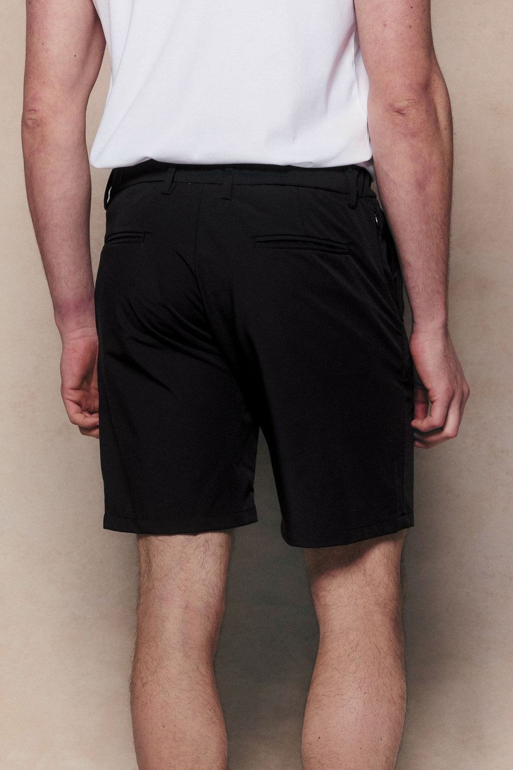 Black Luiz Hybrid Short, regular fit, chino-style with stretch, elasticated back, and concealed pockets.
