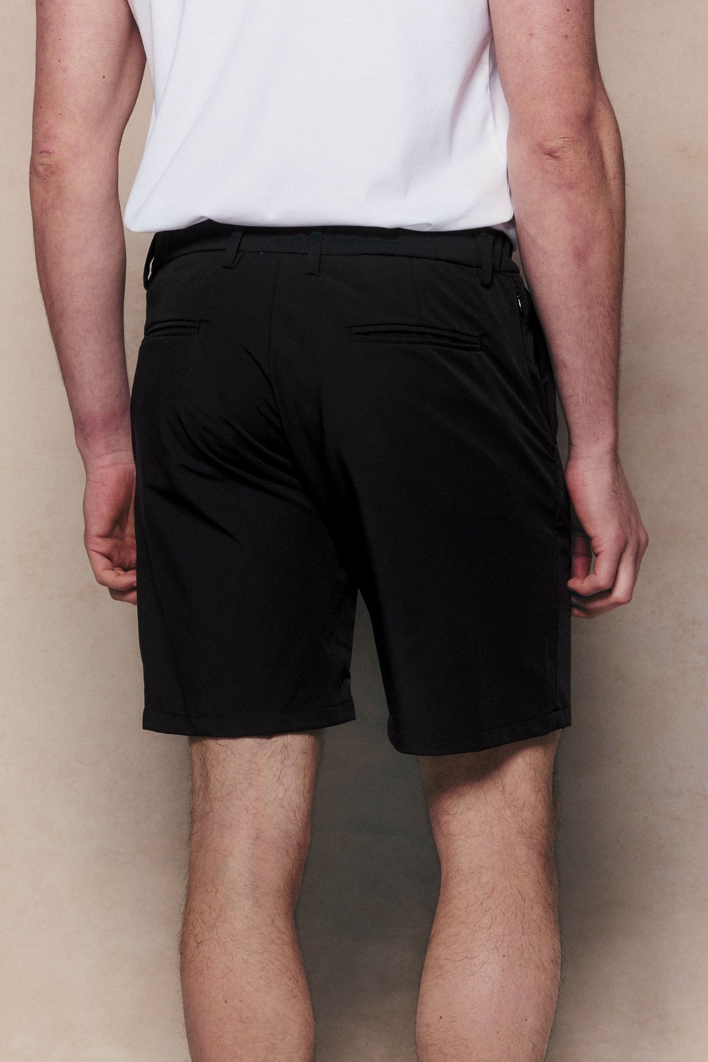 Black Luiz Hybrid Short, regular fit, chino-style with stretch, elasticated back, and concealed pockets.