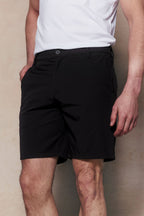 Black Luiz Hybrid Short with tailored finish, four-way stretch, and concealed zip pockets.