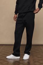 Black Luxe Straight Leg Jogger, made from soft 380gsm fabric, with side pockets and a subtle sheen.
