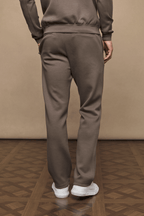 Back view of Luxe Straight Leg Jogger in Burnt Olive, showing straight leg, side pockets, and soft fabric.