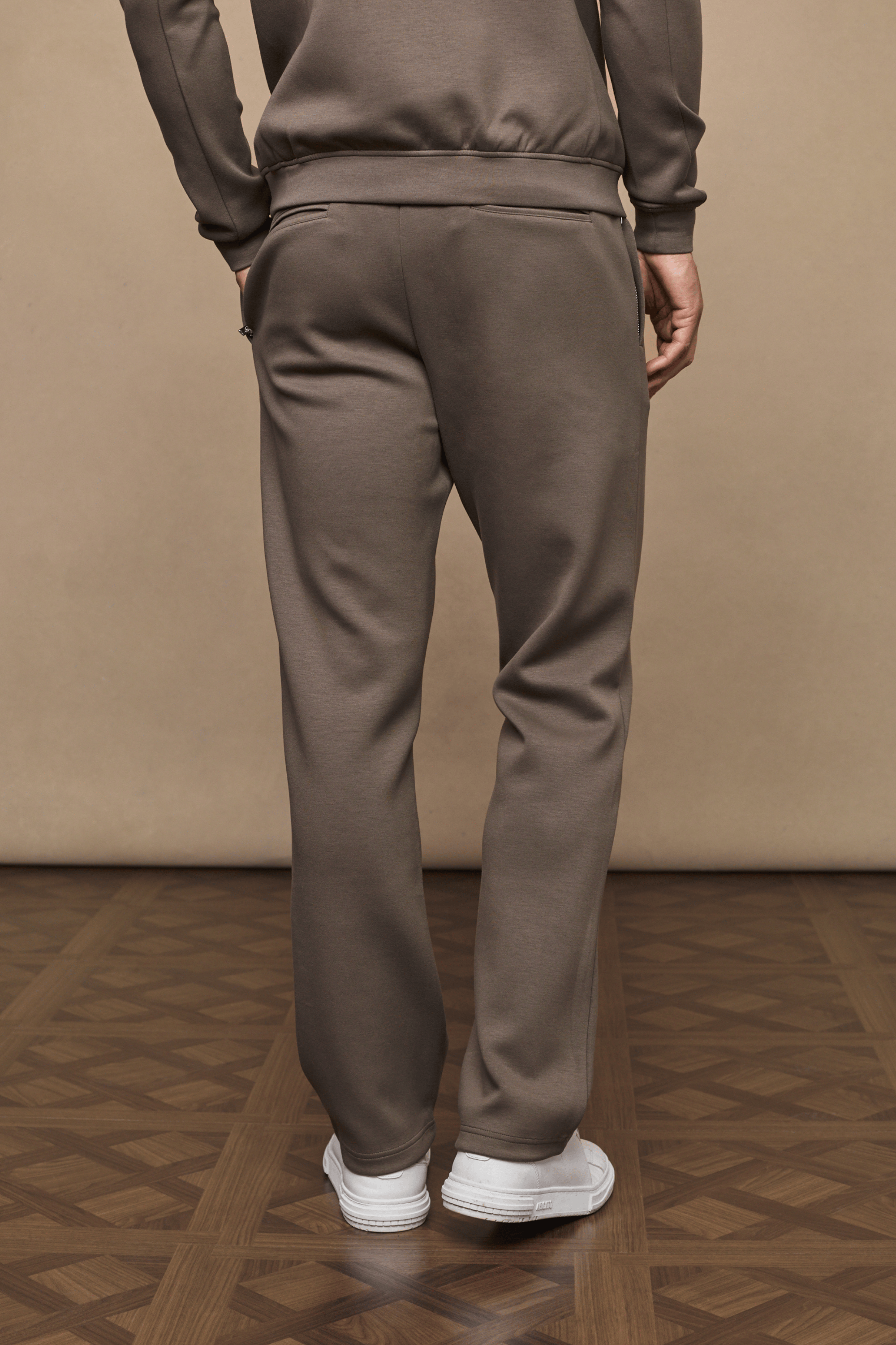 Back view of Luxe Straight Leg Jogger in Burnt Olive, showing straight leg, side pockets, and soft fabric.