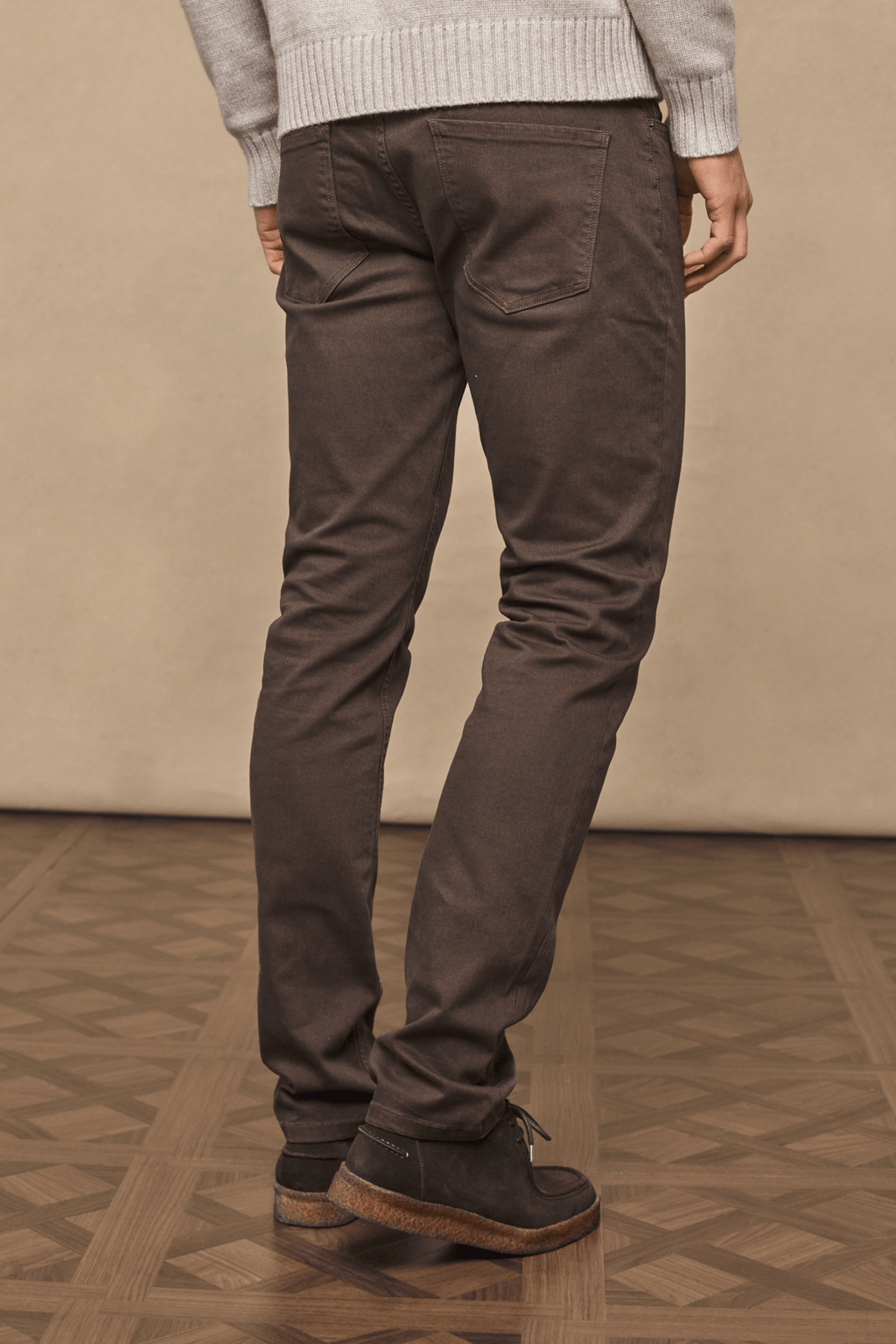 Dark brown Marco Jean in straight-slim fit, with dyed-to-match leather patch and branded hardware.