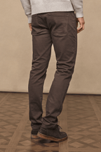 Dark brown Marco Jean in straight-slim fit, with dyed-to-match leather patch and branded hardware.