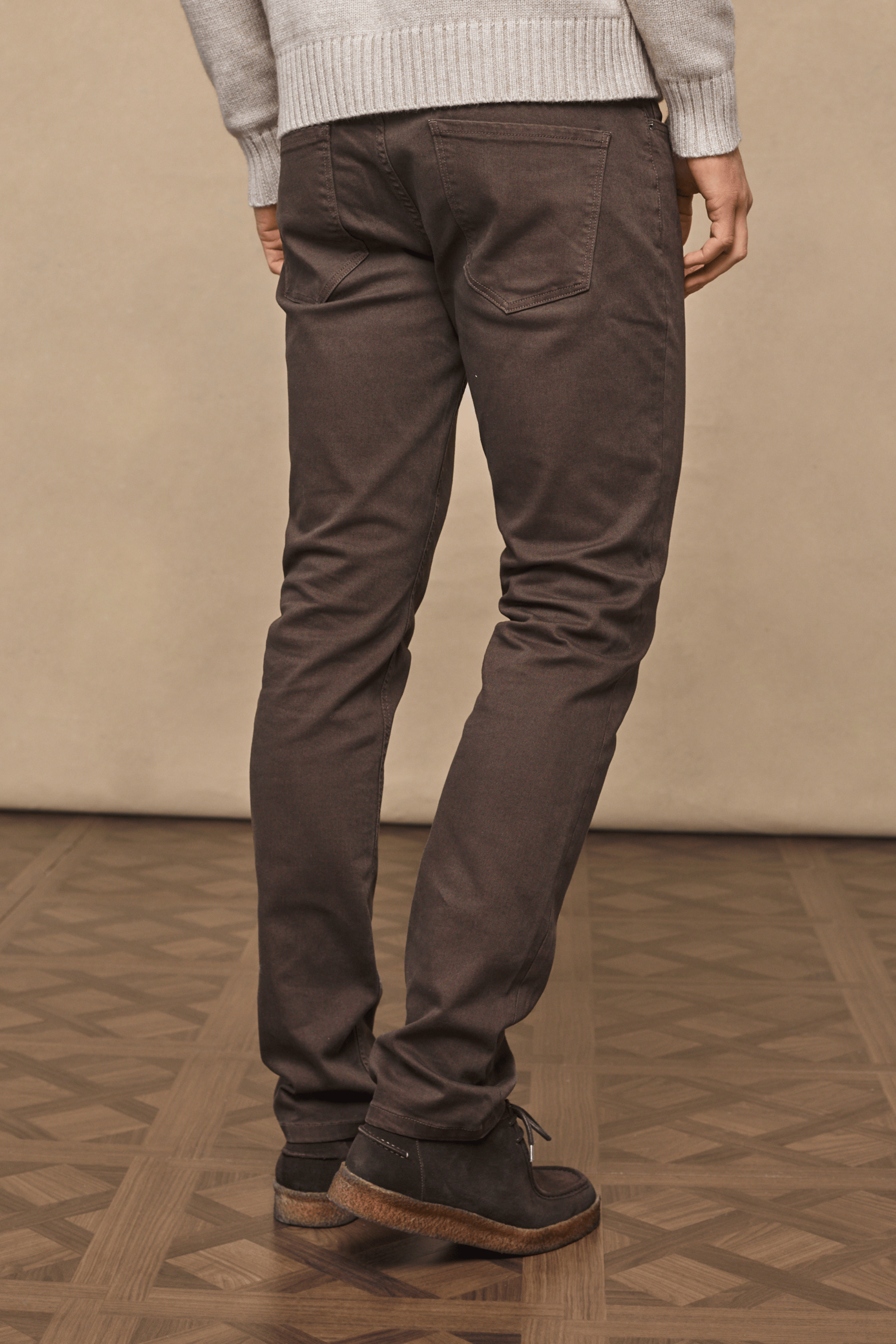 Dark brown Marco Jean in straight-slim fit, with dyed-to-match leather patch and branded hardware.