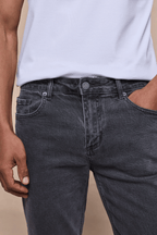 Men's Marco Washed Jean in Washed Grey, featuring a straight-slim fit, button fly, and branded hardware.