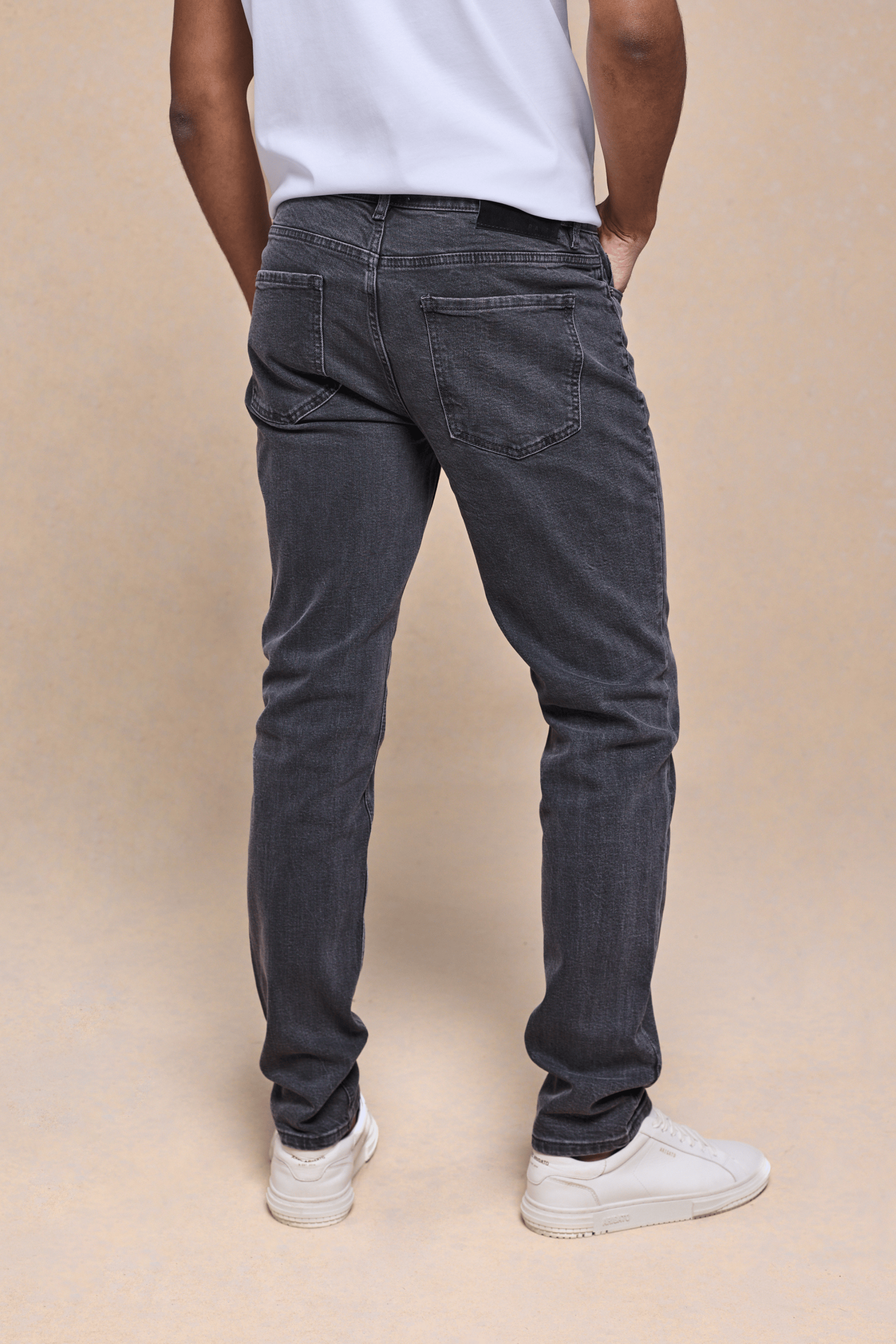 Men's Marco Washed Grey straight-slim denim jeans with back pockets and leather patch.