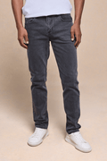 Men's Marco Washed Jean in Washed Grey, straight-slim fit, cotton-elastane denim, with white sneakers.