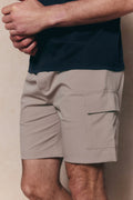 Beige Milo Cargo Tech Shorts with patch side pockets and elasticated waistband.