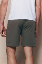Milo Cargo Tech Shorts in Khaki, featuring patch side cargo pockets and an elasticated waistband.