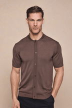 Man wearing a brown Pedro button-through short sleeve knitted shirt with ribbed sleeves and hem.