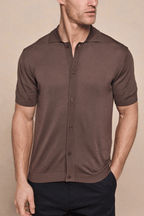 Brown Pedro knitted short sleeve shirt with full button-through front, ribbed sleeves, and hem.