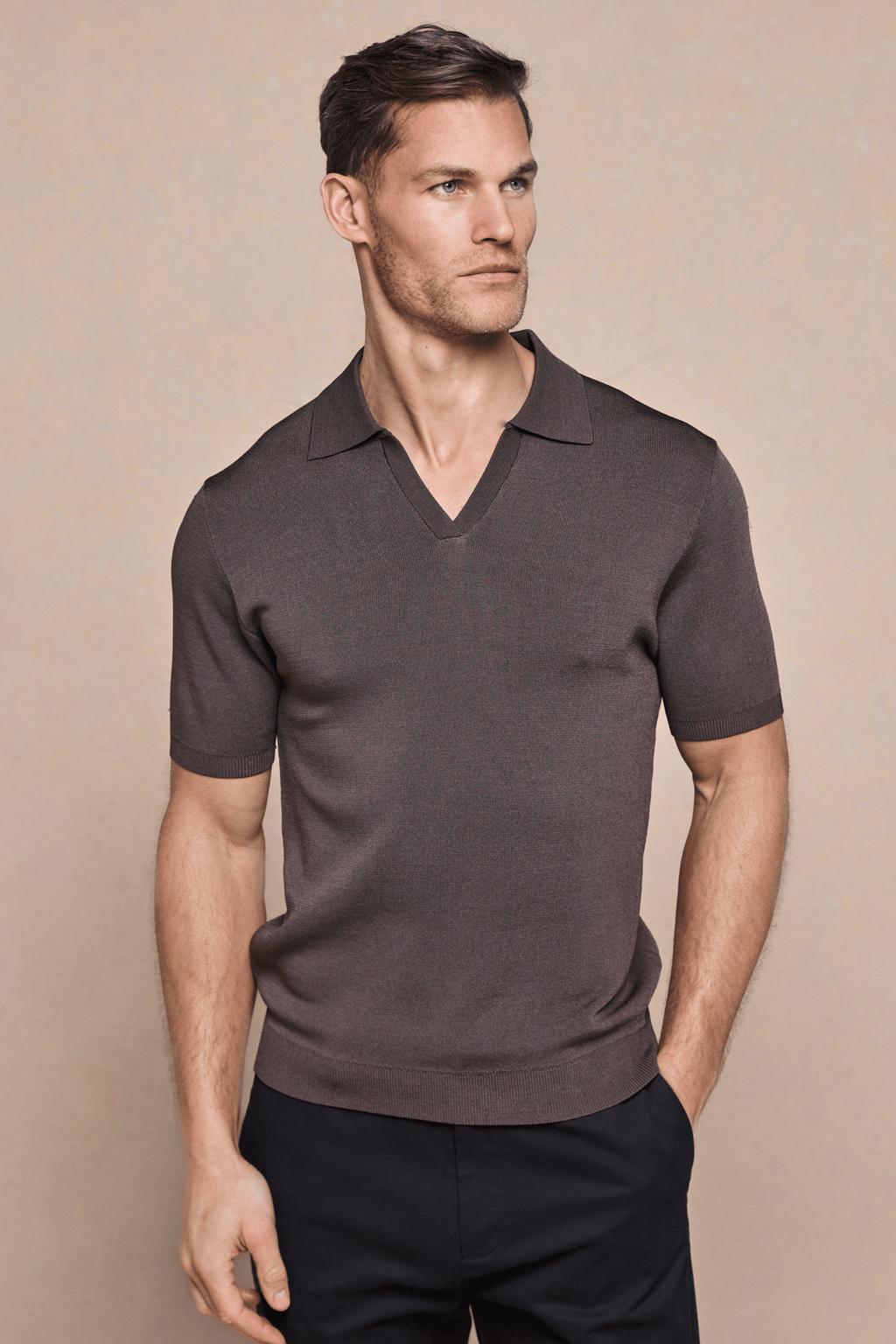 Man wearing a brown Privida Open Collar Polo, showcasing its premium mid-weight fabric and modern open neckline.