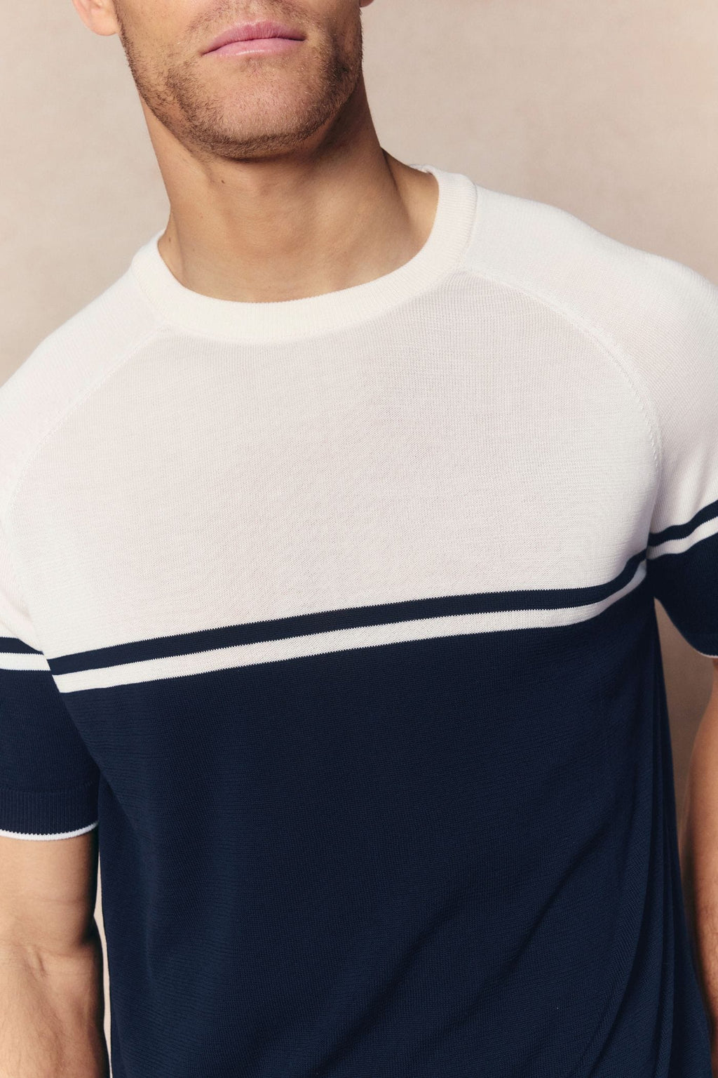 Men's Riera Colour Block Knit Crew Neck T-Shirt in navy and ecru, with a subtle sheen and ribbed trims.