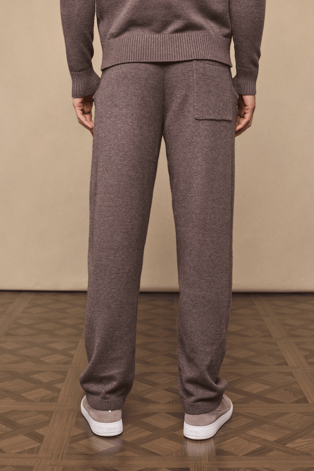 Rowan Knitted Trouser in brown marl, ultra-soft yarn, with a back pocket and adjustable drawcords.