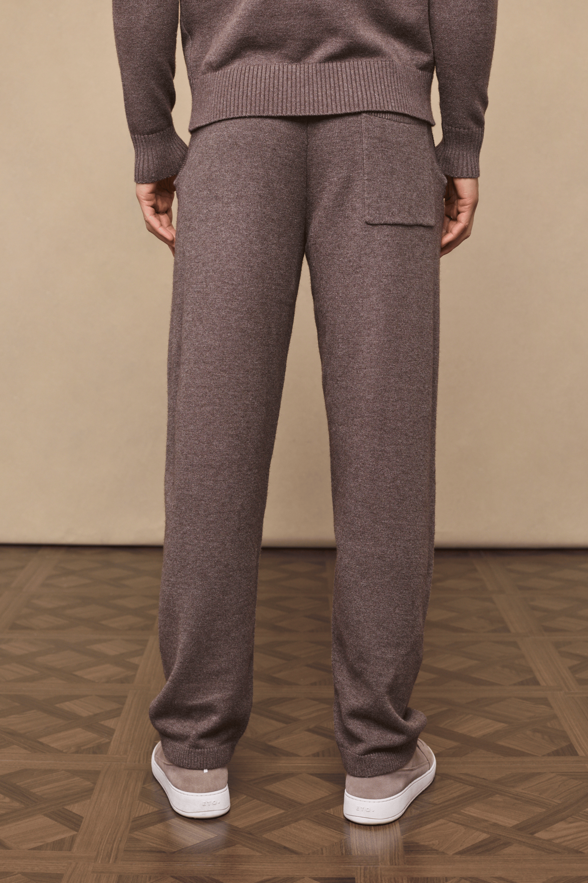 Rowan Knitted Trouser in brown marl, ultra-soft yarn, with a back pocket and adjustable drawcords.