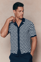 Serenita Ecru/Navy knitted shirt with wavy pattern, open collar, full button placket, and slim fit.