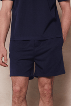 Navy Tomas elasticated waist shorts with drawcords, relaxed fit, and crinkled texture fabric.