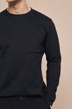 Black Tyler long sleeve crew neck t-shirt with a chest pocket, made from heavyweight cotton-rich fabric.