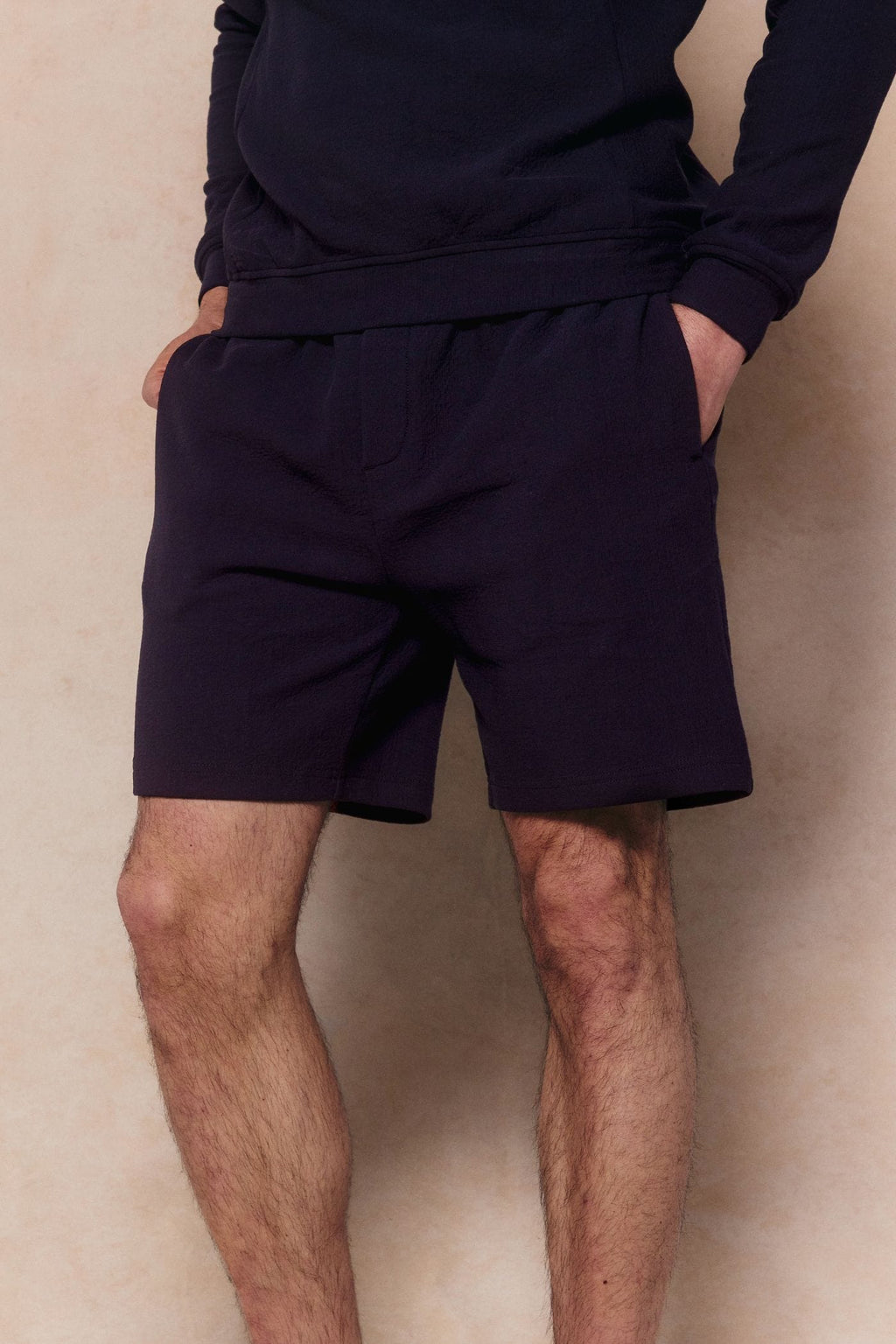 Zarco Navy Crinkled Jersey Short with relaxed fit, textured finish, and stretch fabric.